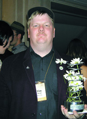  ��� ������ (Tim Harrod) �� The Onion, 2002 ���.